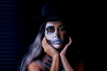 Spooky portrait of woman in halloween gotic makeup