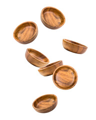 Falling wooden plate, bowl, isolated on white background, clipping path, full depth of field