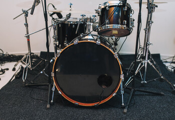 Drum set close-up in a studio interior.