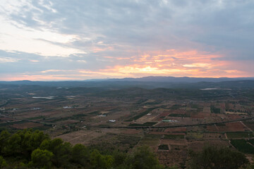 Spanish plains & hills from the Santa Lucia belvedere (Alcossebre or Alcala de Xivert, Spain). Beautiful view of magnificent nature during sunset. Cloudy day on the panoramic spot.