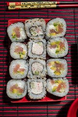 Making at home Japanese-style hand-rolled sushi