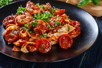 Pappardelle pasta with shrimp, tomatoes and herbs