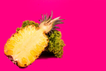 Pineapple close up. healthy life, proper nutrition. isolated on the pink background. copy space