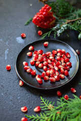 pomegranate red fruit sweet christmas dessert on the table new year tasty treat serving size top view copy space for text food background rustic