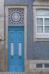 openwork cast iron rosette above a door in the old town of Porto, Portugal