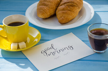still life of cake with cup of coffee highlighted by sunlight