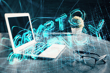 Double exposure of blockchain theme hologram and table with computer background. Concept of bitcoin crypto currency.