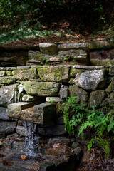 Stone Water Fountain in the Woods