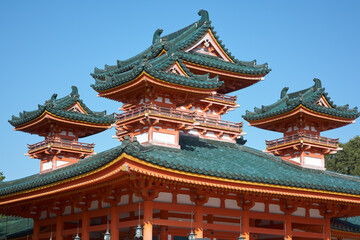 The blue-green curved roofs of Byakko-ro Tower at  Heian-jingu Shrine. Kyoto. Japan