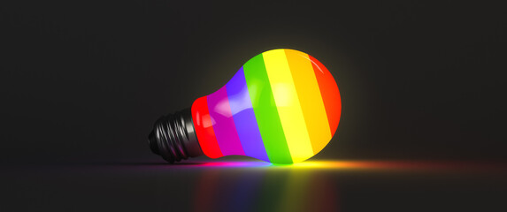 Lgbt enlightenment and education concept. Rainbow colored light bulb with copy space.