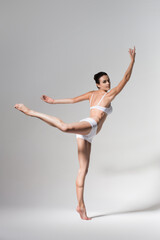 Fototapeta premium ballerina dancing in studio