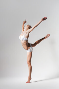 ballerina dancing in studio in underwear