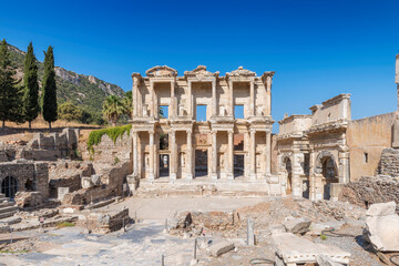 Fototapeta na wymiar Celsius Library in ancient city Ephesus (Efes). Most visited ancient city in Turkey. Selcuk, Izmir, Turkey.