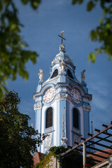 The baroque clocktower of the former Augustinian abbey in Durnstein, Wachau Valley, Austria