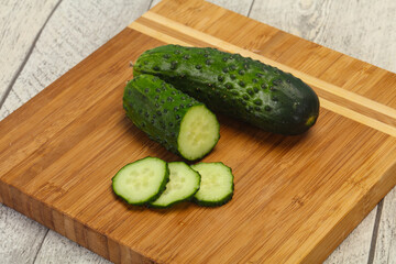 Ripe fresh green two cucumbers