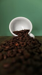 Coffee beans in a coffee cup