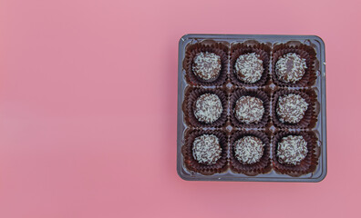 Mini cake petits fours  with coconut cream filling.