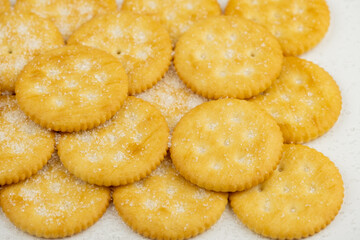 Pile of round cracker with sweet sugar on top pattern