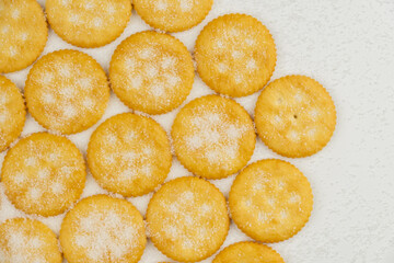 Spread of round cracker with sweet sugar isolated on white background