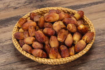 Sweet tasty dry dates in the basket