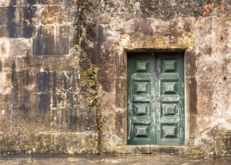 Old Doors And Aged Composite Wall. Templar Castle/Convent Of Christ, Tomar, Portugal.