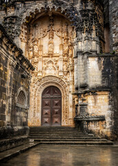 Entrance Facade With Unique Sculptures and Elaborate Front Door. Templar Castle/Convent Of Christ, Tomar, Portugal.