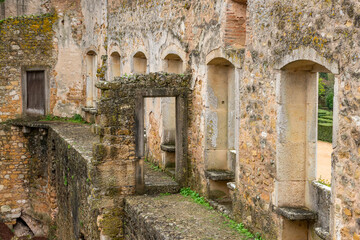 Fototapeta na wymiar Ruins And Bare Walkway With Unique Stand Alone Stone Door Frame. Templar Castle/Convent Of Christ, Tomar, Portugal.