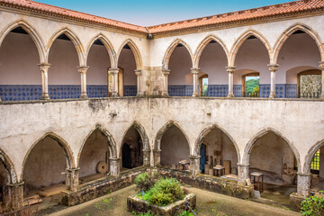 Fototapeta na wymiar Two Level Of Cloisters, Including Columns, Arches And Courtyard. Templar Castle/Convent Of Christ, Tomar, Portugal.