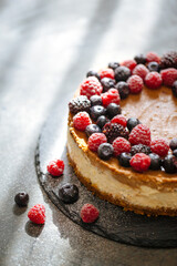 Two-layer cheesecake decorated with berries