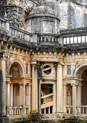 Fototapeta premium Winding Stone Staircase And Small Tower, At Cloister Convergence. Templar Castle/Convent Of Christ, Tomar, Portugal.