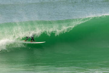 Fototapeta premium Surfer in a big wave, Anglet in the pays basque, France 