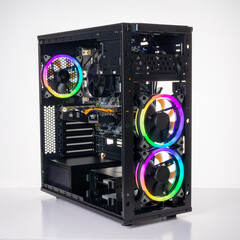 Studio shot of black Gaming desktop pc with rgb lights and visible components. Isolated on white background.