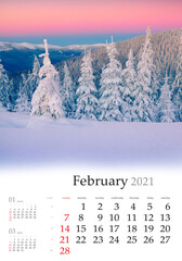 Calendar February 2021, vertical B3 size. Set of calendars with amazing landscapes. Picturesque winter view of mountain forest. Spectacular sunrise in Carpathian mountains, Ukraine, Europe..