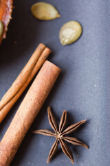 Star anise, cinnamon sticks, pumpkin seeds