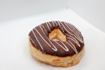 chocolate muffin or donuts on white isolated