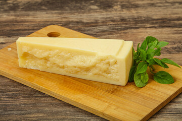 Hard parmesan cheese served basil