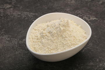 Wheat flour heap in the bowl