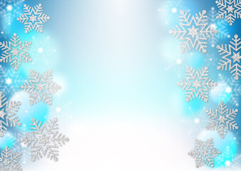 銀色のラメの雪の結晶　水色のグラデーション背景　ふわふわの青のドット　冬のフレーム素材