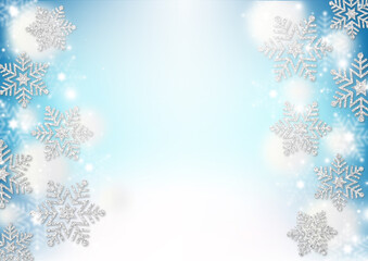 銀色のラメの雪の結晶と綿雪　水色のグラデーション背景　ふわふわの白のドット　冬のフレーム素材