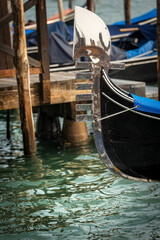 Fototapeta na wymiar Venice, close-up of a Gondola prow , typical Venetian rowboat, Canal Grande, UNESCO world heritage site, Veneto, Italy, Europe.