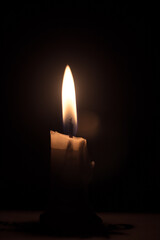 candle in the dark background