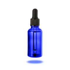 Dark blue glass bottle of face serum or essential oil