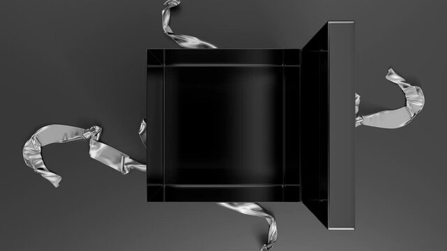 Elegant black gift box with ribbon opening. Top view.
Black gift box with ribbon opening. Include multimatte channel