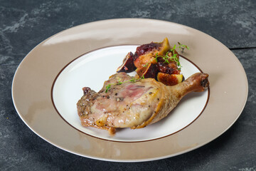 Roasted. duck. leg with plum and apple