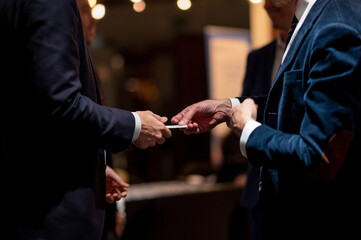 Exchange Of Business Cards at a Networking Event