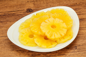 Marinated pineapple rings in the bowl