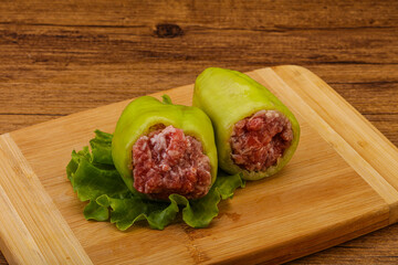 Raw stuffed pepper for cooking