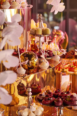 Delicious candy bar. Table with sweets, candies, dessert