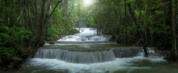 Fototapete Panoramic beautiful deep forest waterfall in Thailand © yotrakbutda