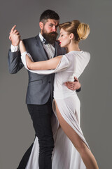 Advertisng. Waltz. Sensual couple dancing waltz. Passion and love concept. Dancing, Salsa, Tangoing. Couple in tender passion. Ballroom dancing.